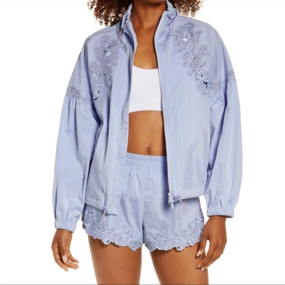 Never been work, beautiful Free People periwinkle color lightweight jacket.
